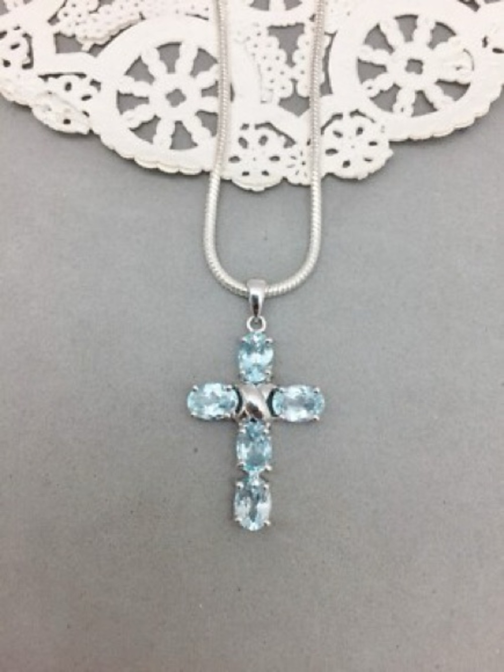 Sterling Silver Blue Topaz Oval Gems Christian Cross Pendant